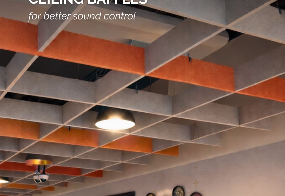 Suspended grey and orange PET felt ceiling baffles in an office